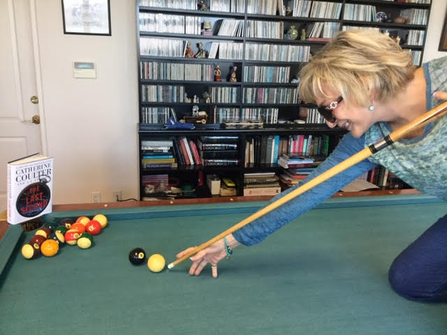 Catherine playing pool